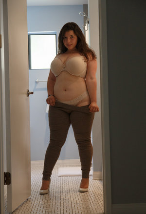 18 year old female Chloe Dash undressing on yoga mat on lawn